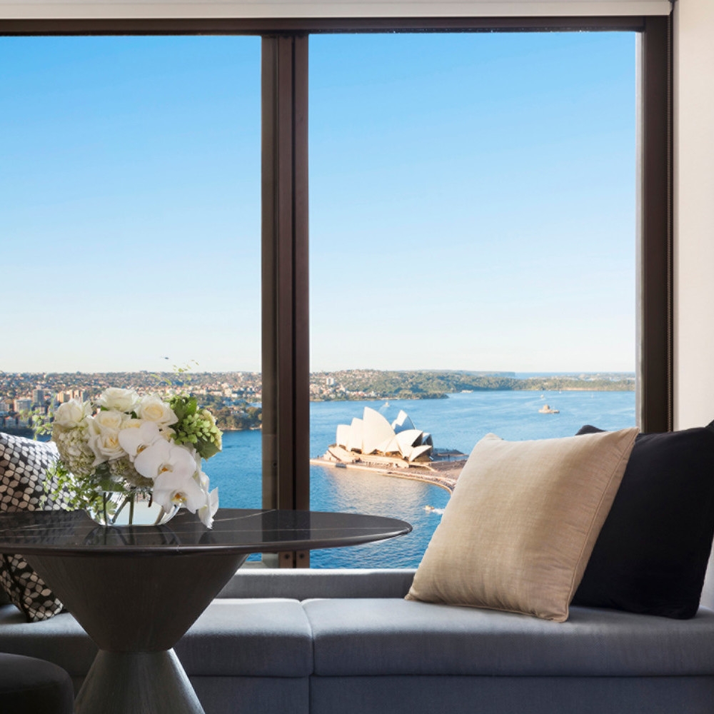 A view of Sydney Opera House through the window of Four Seasons Sydney