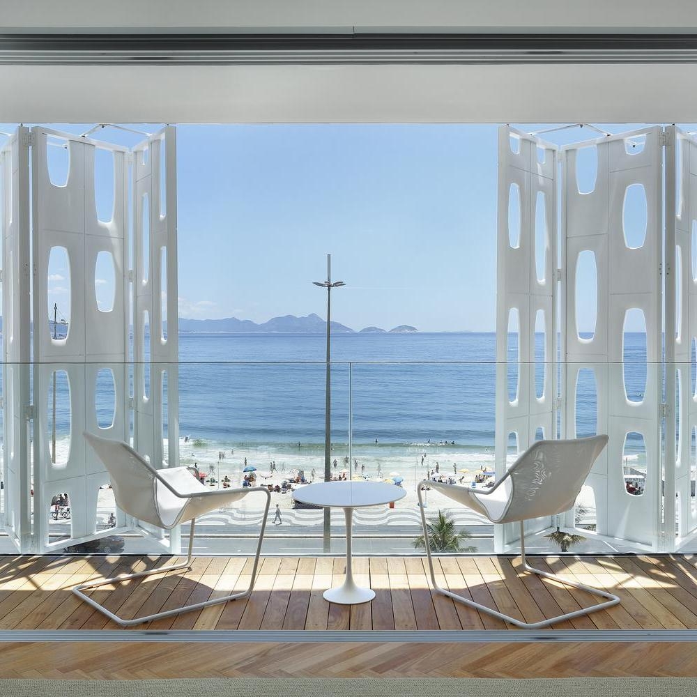 A view of a room balcony at Emiliano Rio hotel with views over Copacabana Beach