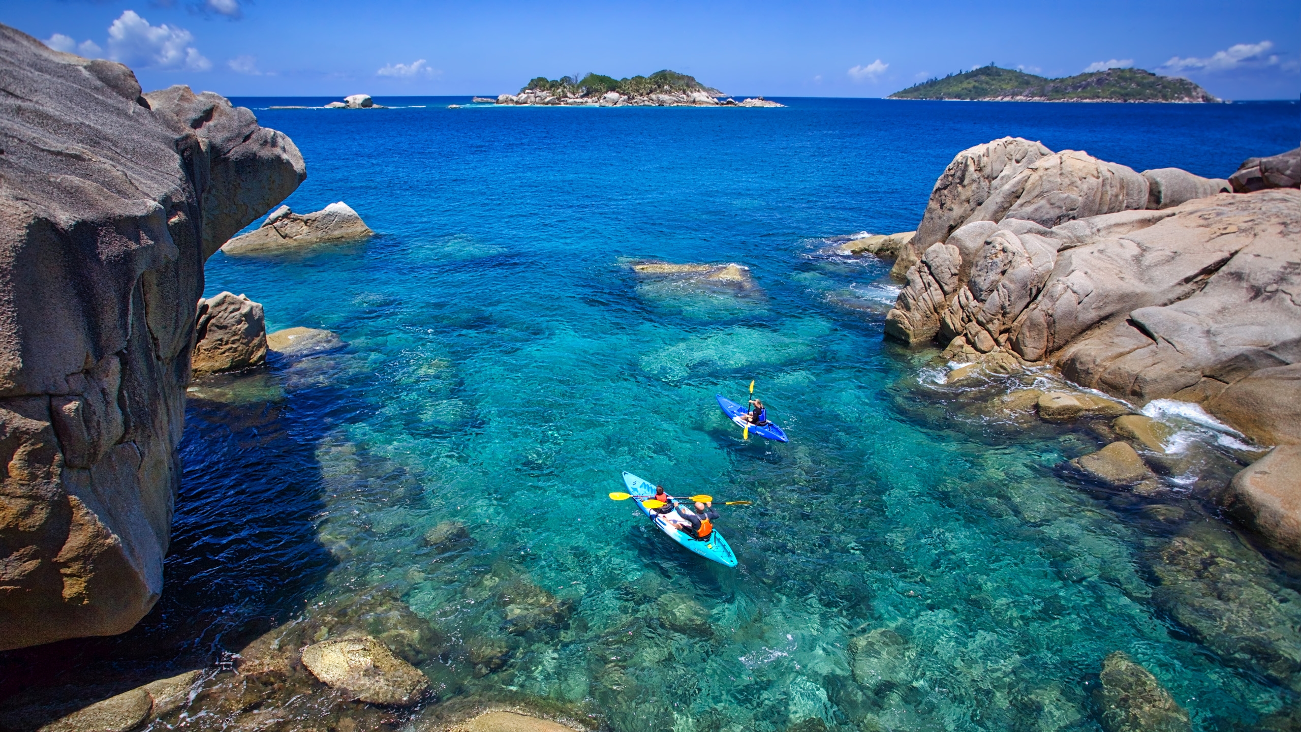 Kayaking on the crystal clear waters at Six Senses Zil Pasyon in the Seycelles.