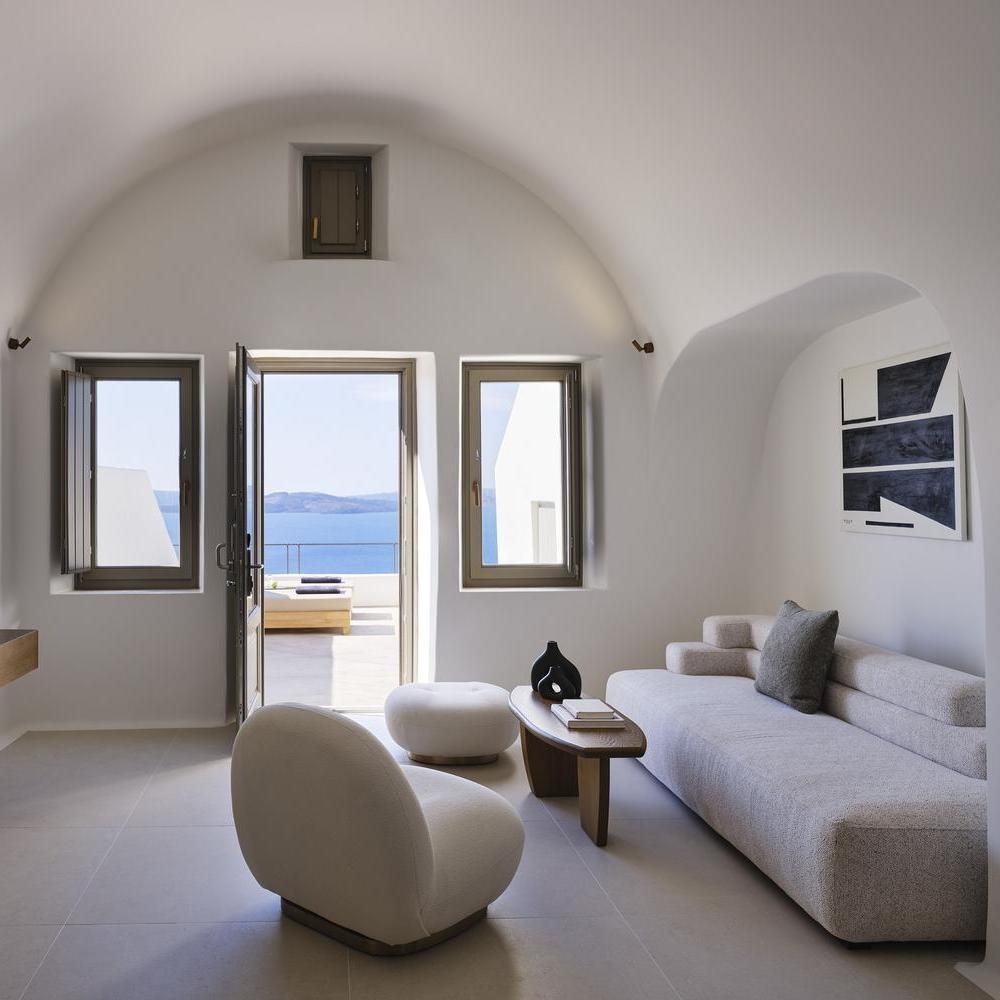 Sitting area with outdoor access at Andronis Luxury Suites