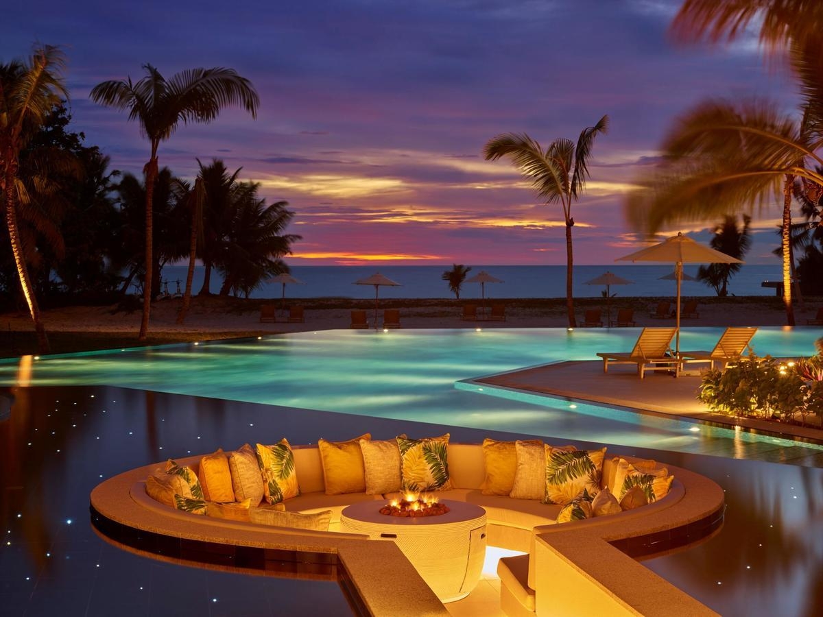 La Perle Lounge at sunset at Waldorf Astoria Seychelles Platte Island.