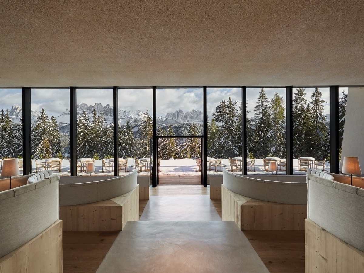 Restaurant tables with mountain views at Forestis Dolomites