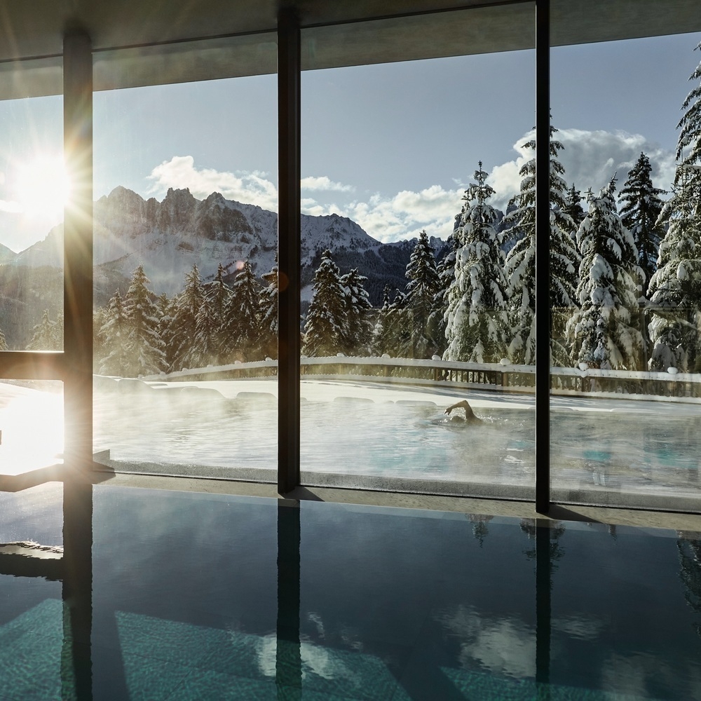 Spa pool with indoor and outdoor swimming at Forestis Dolomites