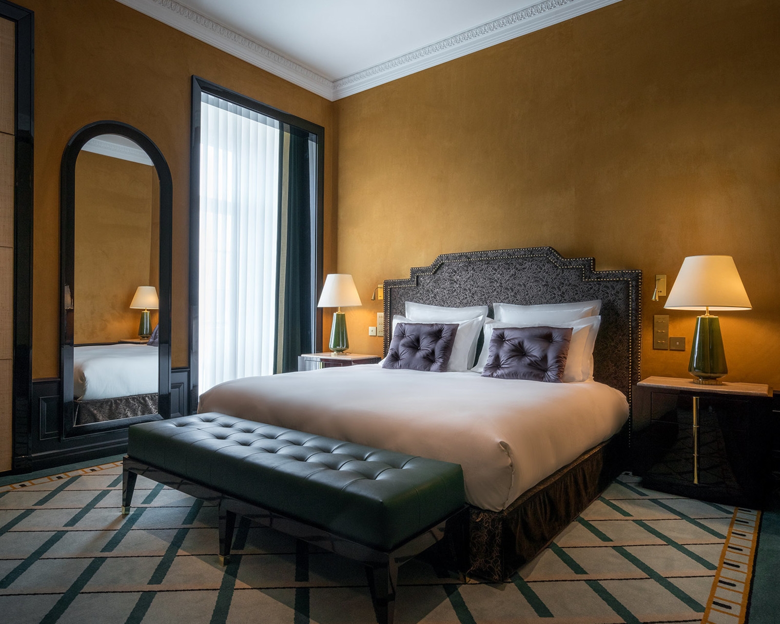 A bed in a Suite Monumentale in Le Monumental Palace