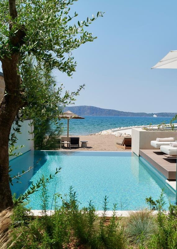pool a step from the beach at W Costa Navarino