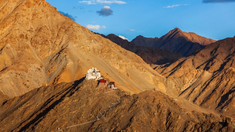 Ruins of Tsemo (Victory) Fort, Namgyal Tsemo Gompa on the cliff of Namgyal hill and Himalayas