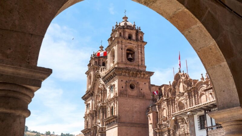 A church in the city of Cusco, Peru, seen through an archway
