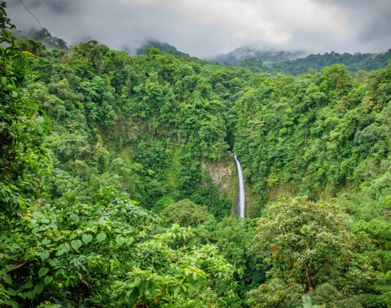 Wide angle view of La Fortuna de San Carlos waterfall in Arenal Volcano National Park