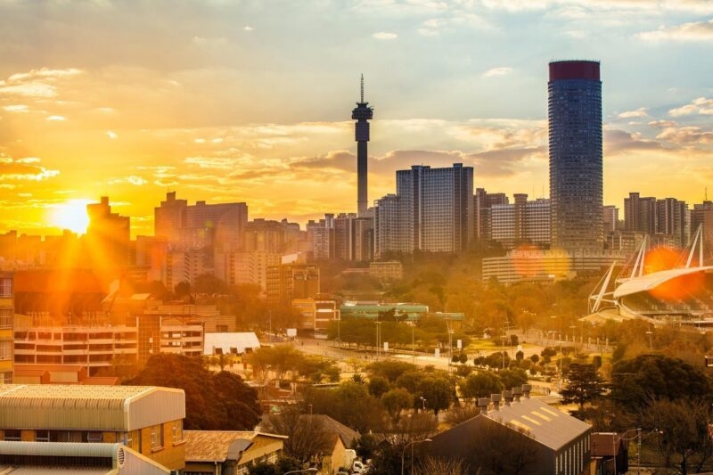 Johannesburg city skyline illuminated by sunset