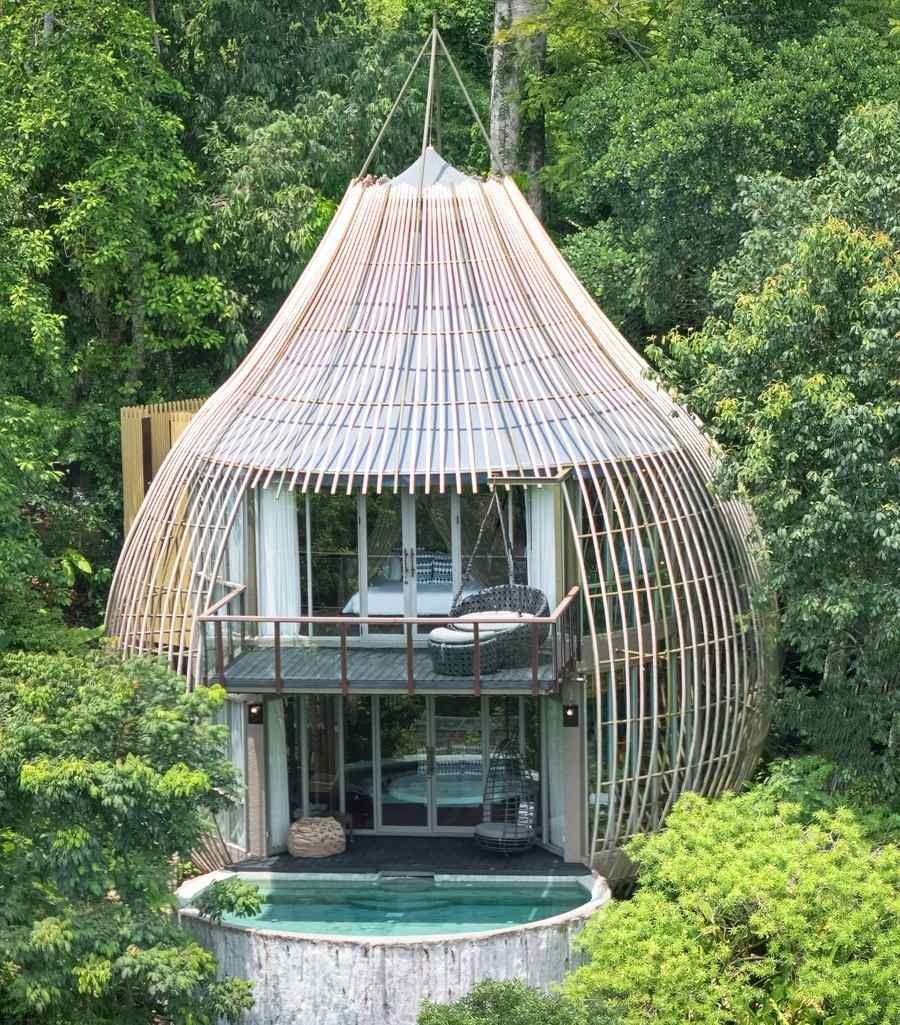 Keemala's tree villa surrounded by greenery.