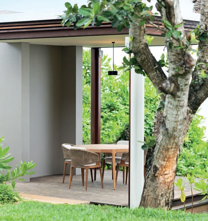 The open-air dining area of a villa at Cheval Blanc Seychelles.
