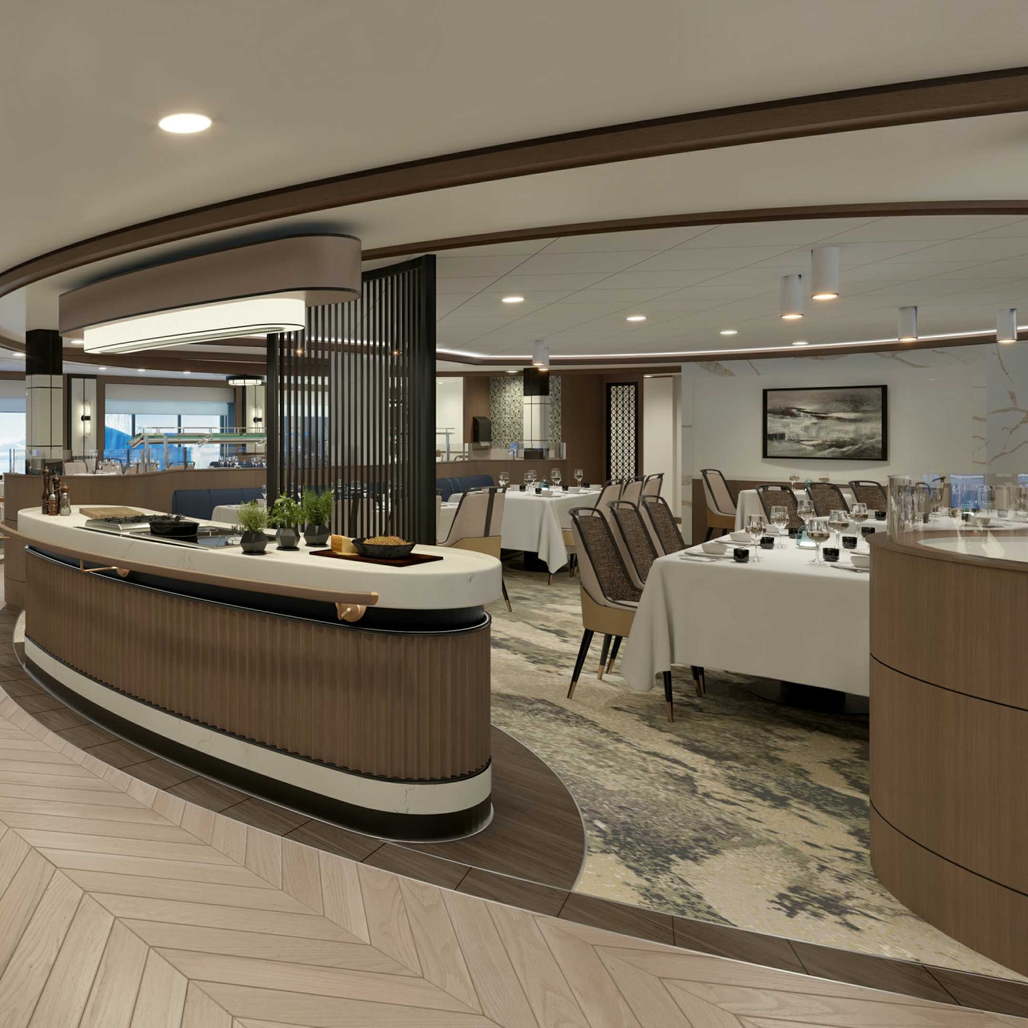 Restaurant area with tables with white table cloths; in the foreground, a light wood walkway.
