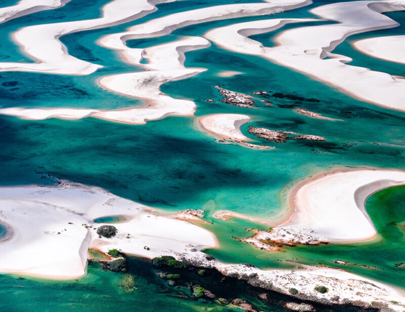 Jacada Travel Brazil - Aerial view of LenÁois Maranhenses, rippling sand amongst turquoise blue water