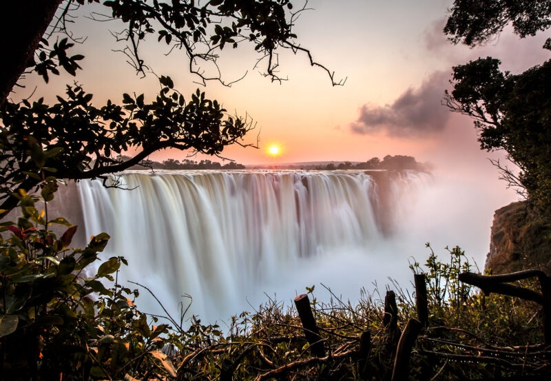 A large powerful waterfall at sunrise