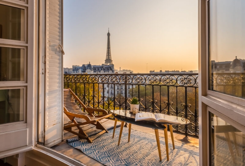 Luxury Grand Tours of Europe - beautiful paris balcony at sunset with eiffel tower view