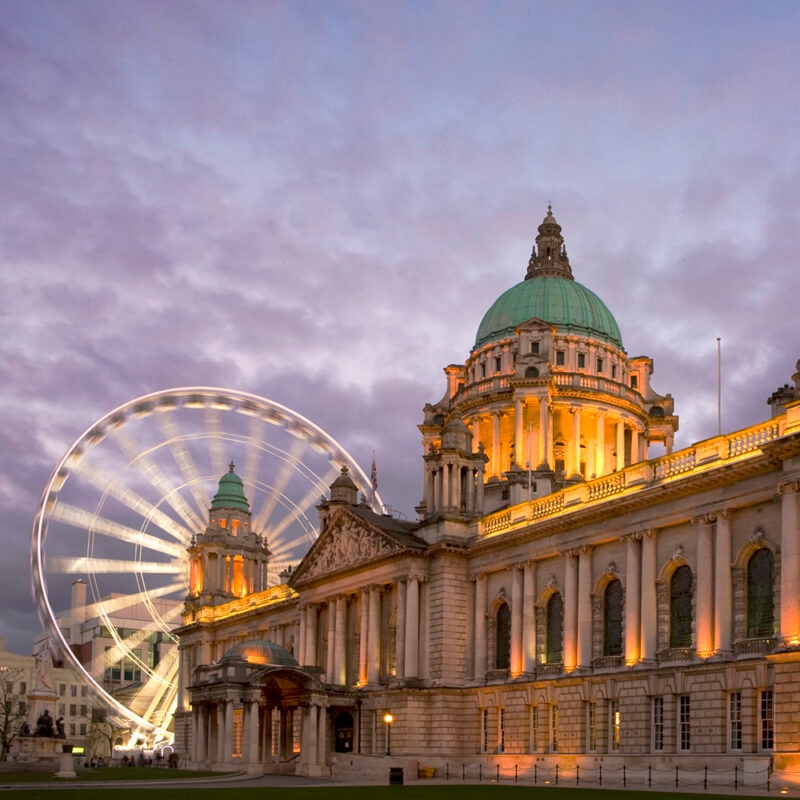 Luxury Grand Tours of Europe - Belfast Eye at night lit up