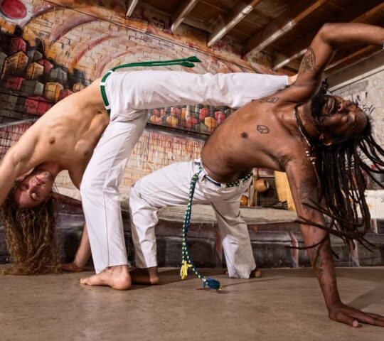 Men performing the Brazilian martial art of capoeira