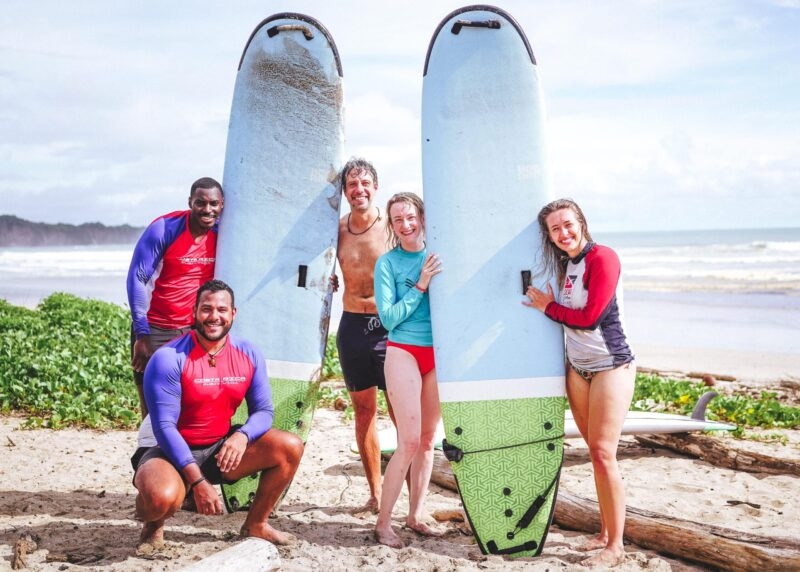 surfers with surfboards