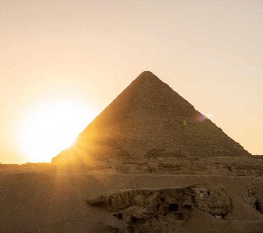 archaeological complex of Great Egyptian Pyramids is located on the Giza plateau, in the Libyan desert, on the left bank of the Nile. Pyramids of Cheops Khufu. Cairo, Egypt.