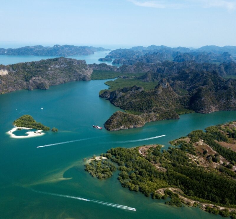 Area of Park Kilim Geoforest. Beautiful bay, coastline, mangroves and mountains on photo. Langkawi, Malaysia.