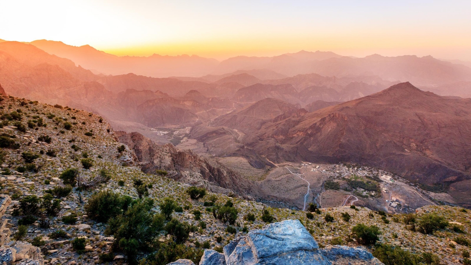 Scenic view of Al Hajar mountains in the Sultanate of Oman at sunset