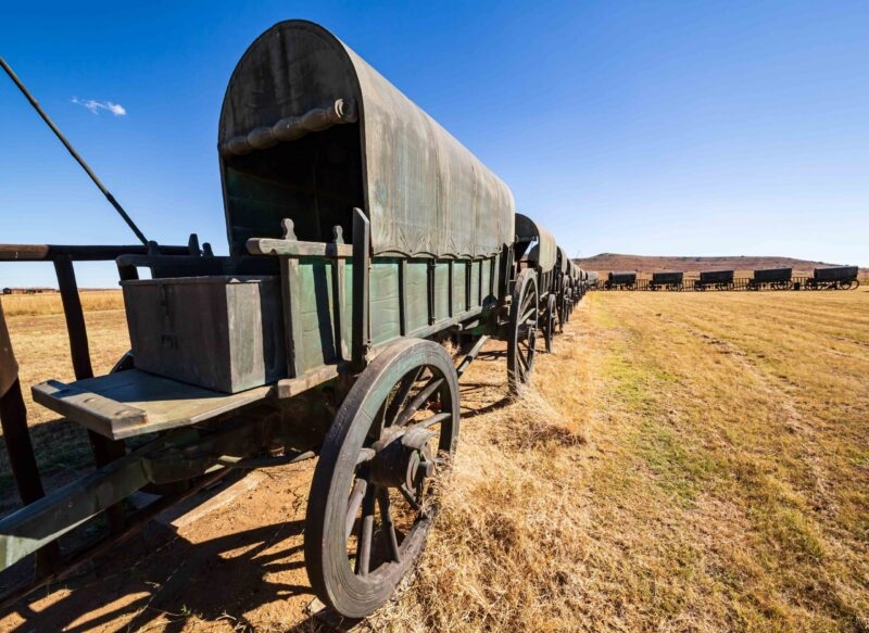 Circle of 64 replica Voortrekker wagons cast in bronze at Blood River battlefield Heritage Site, KwaZulu-Natal, South Africa