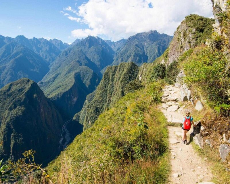 A woman hiking the Inca Trail in Peru