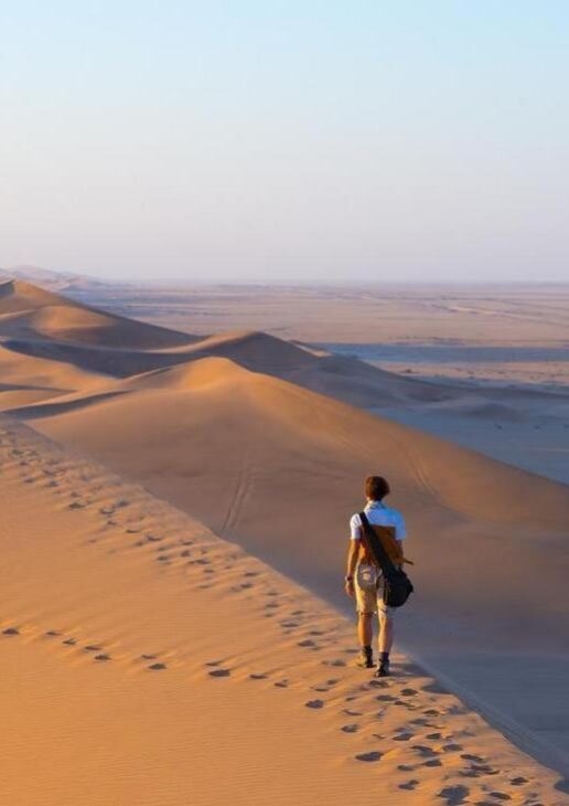 Hiking sand dunes in Sossusvlei, exploring the Okavango Delta by mokoro canoe, and spotting gorillas in Rwanda