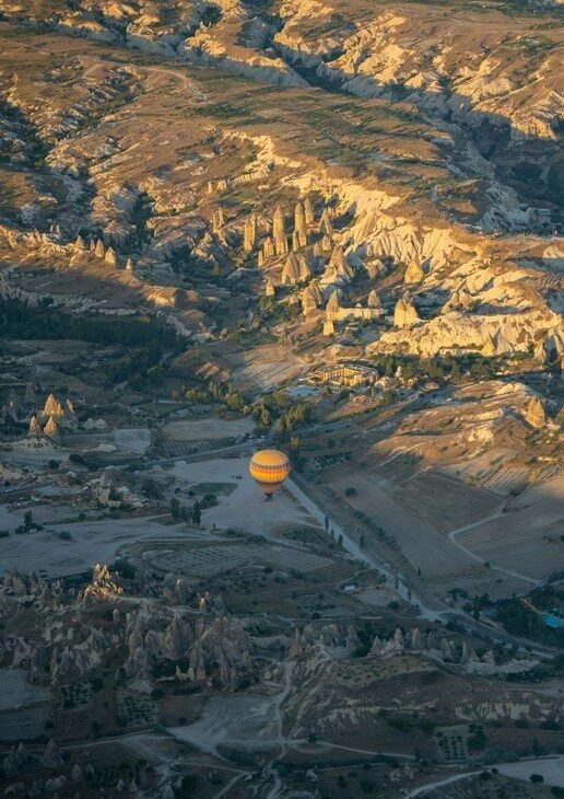 The vast plains of the Serengeti National Park, the temples and desert valleys of Luxor and drifting over Cappadocia’s fairy chimneys.