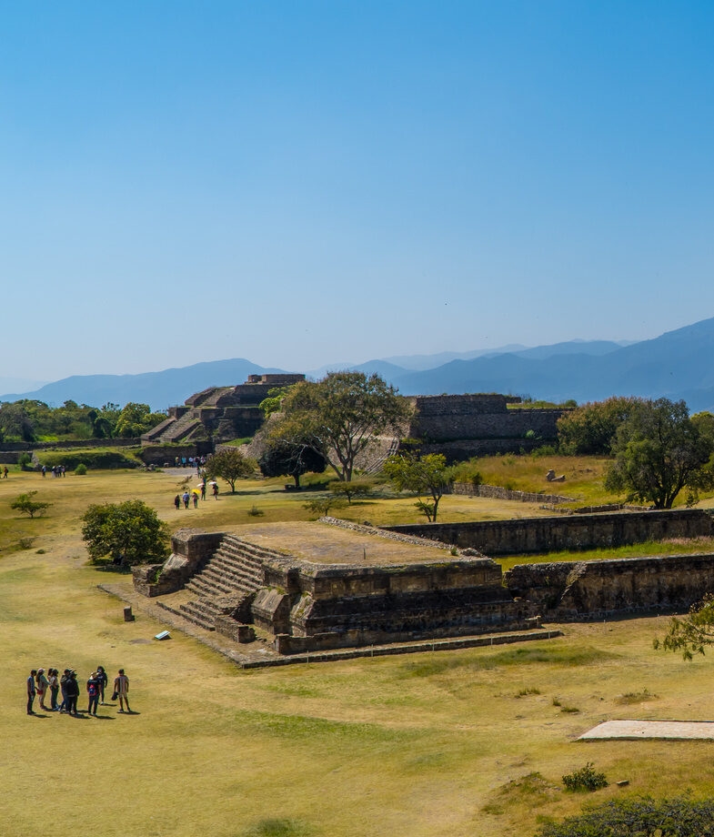 The ancient Zapotec ruins of Monte Albán, Oaxaca, and the vast Copper Canyon during sunset in Chihuahua.