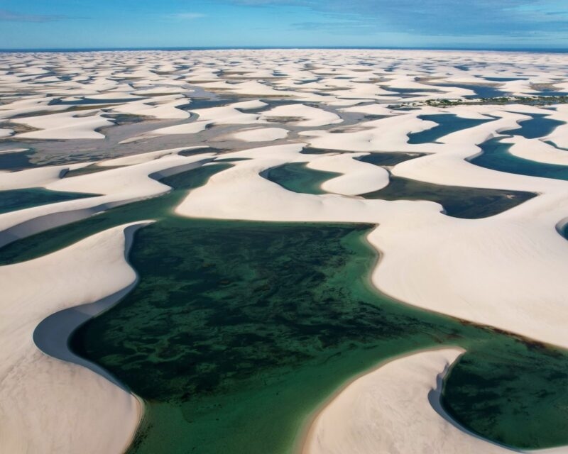 Aerial view of sand dunes and lagoons at Lençóis Maranhenses