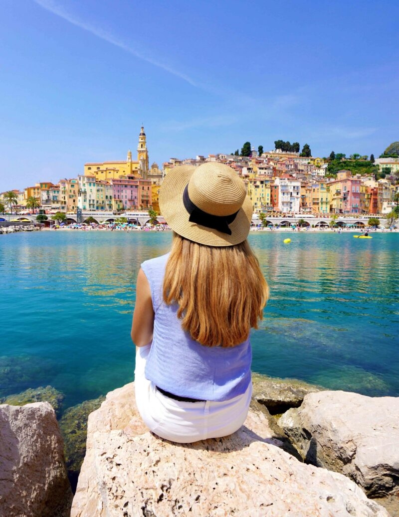 A woman enjoys the view on the French Riviera.