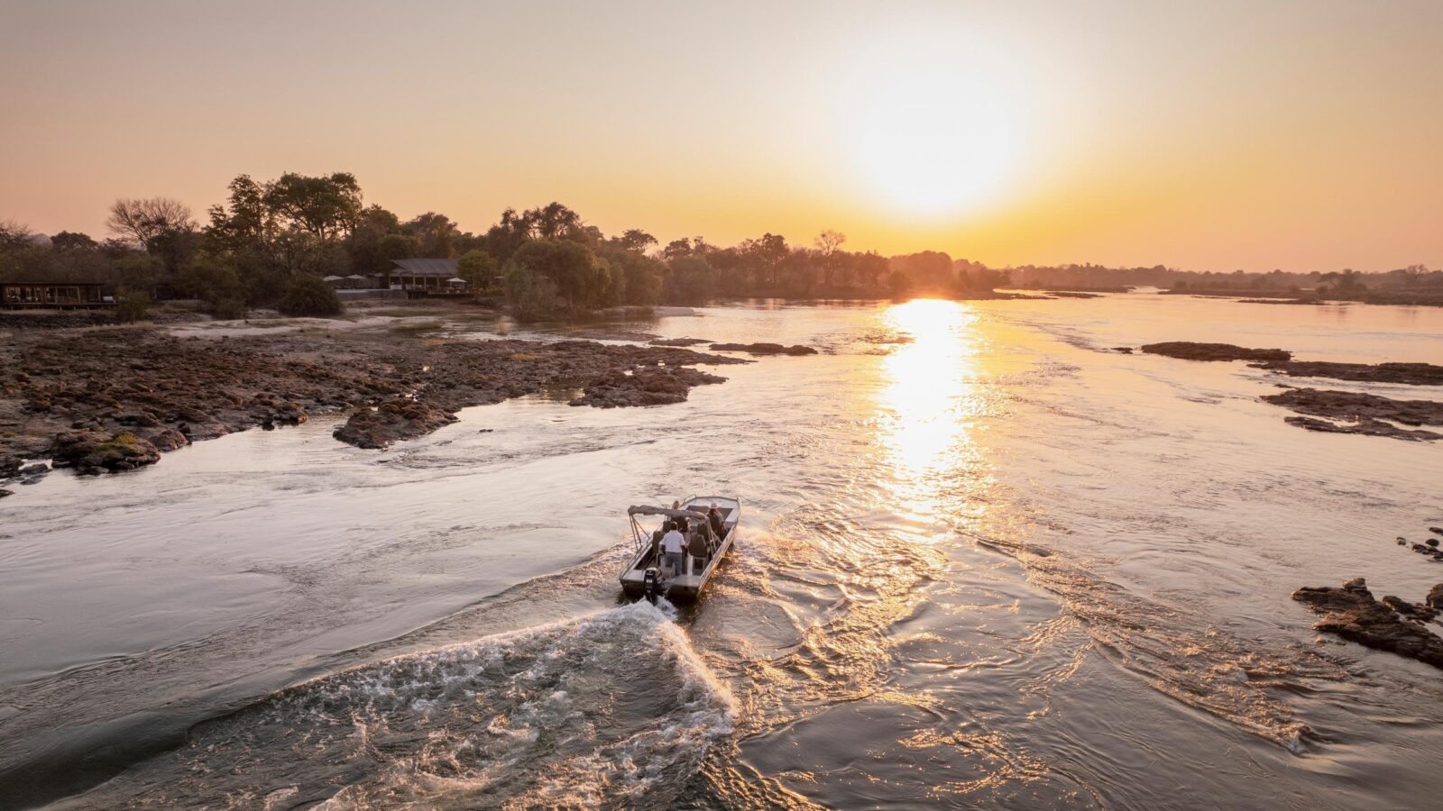 Zambia boat family trip during sunset