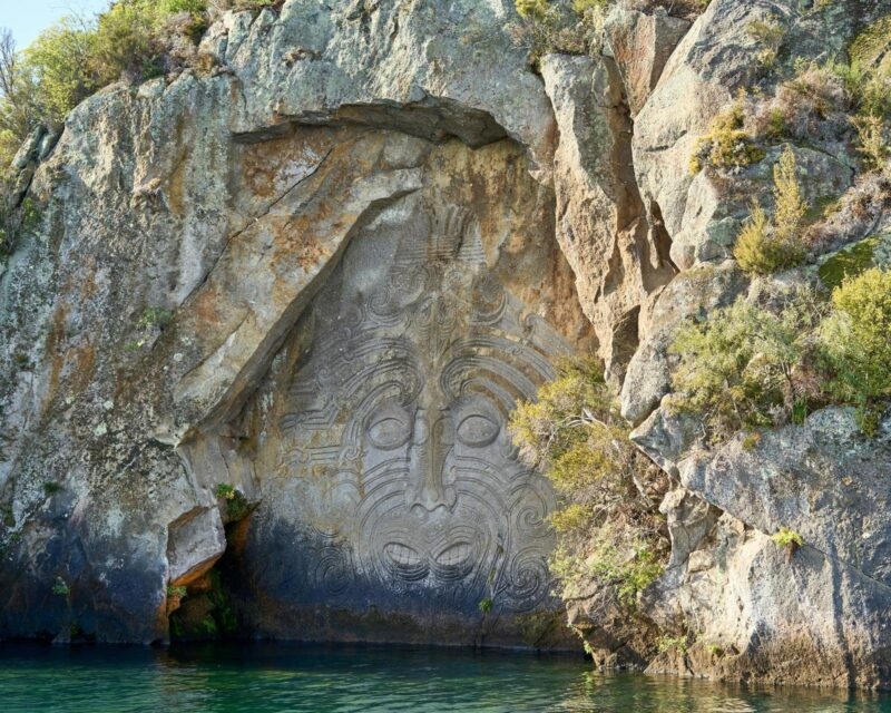 maori culture in rock in one of the natural pools in new Zealand