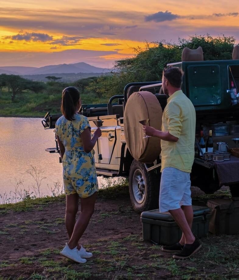 A classic sundowner in South Africa’s Kruger National Park, and a private mokoro safari drifting through Botswana’s Okavango Delta as the light turns golden.