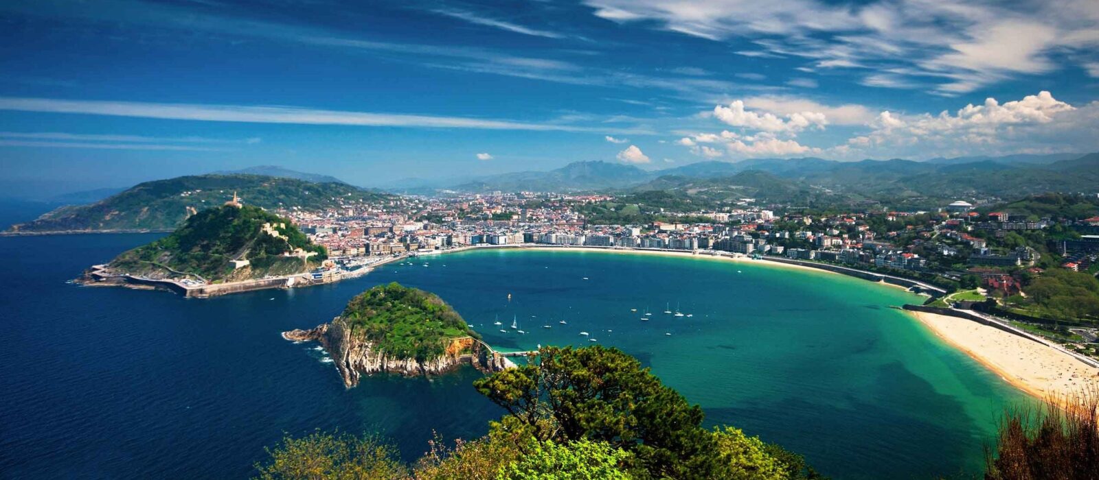 Aerial view of San Sebastian set on the beautiful azure bay.