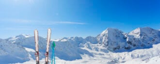 Mountains and ski equipments on slope, Alps