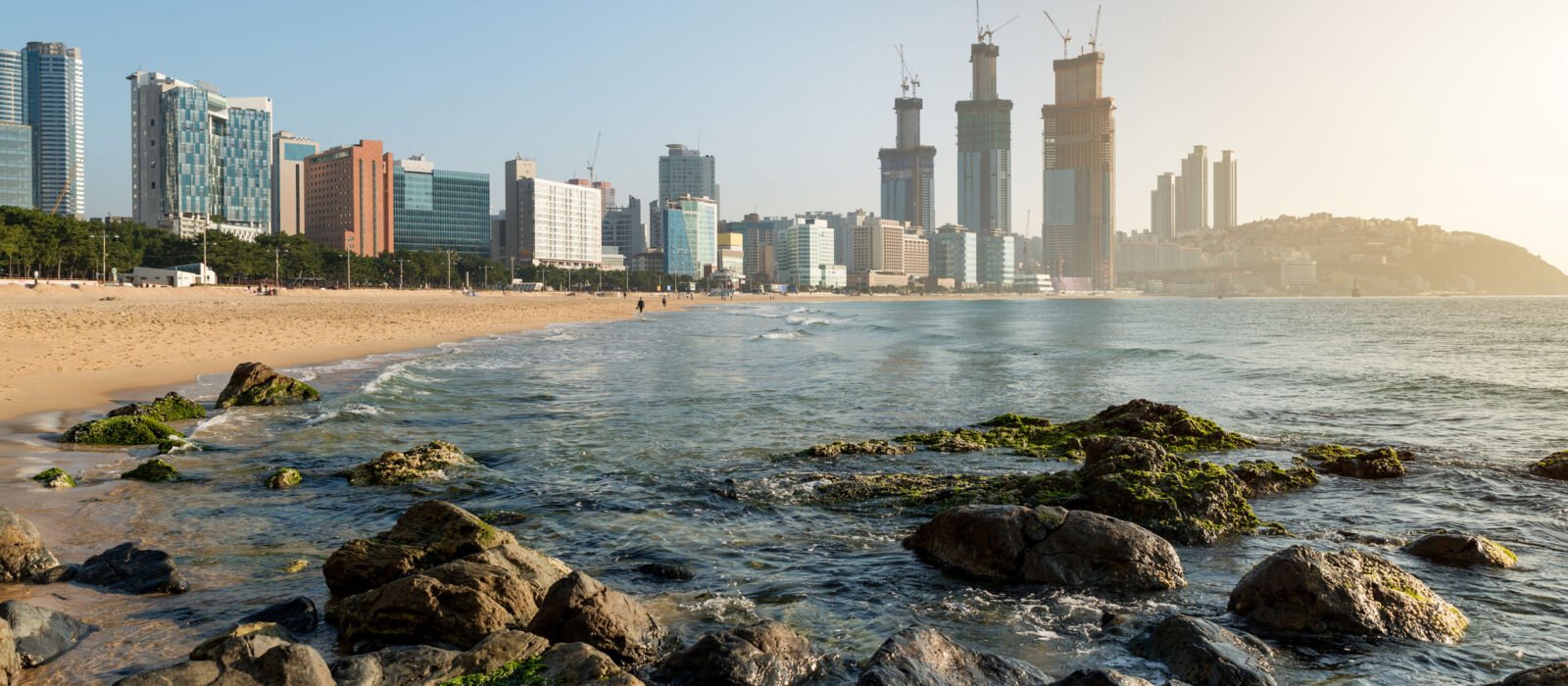 Calm waves lapping the quiet golden sands of Haeundae Beach, Busan