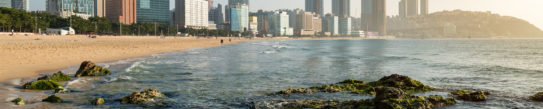 Calm waves lapping the quiet golden sands of Haeundae Beach, Busan