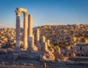 The column remains of the Temple of Hercules overlooking the sand-coloured city of Amman in Jordan