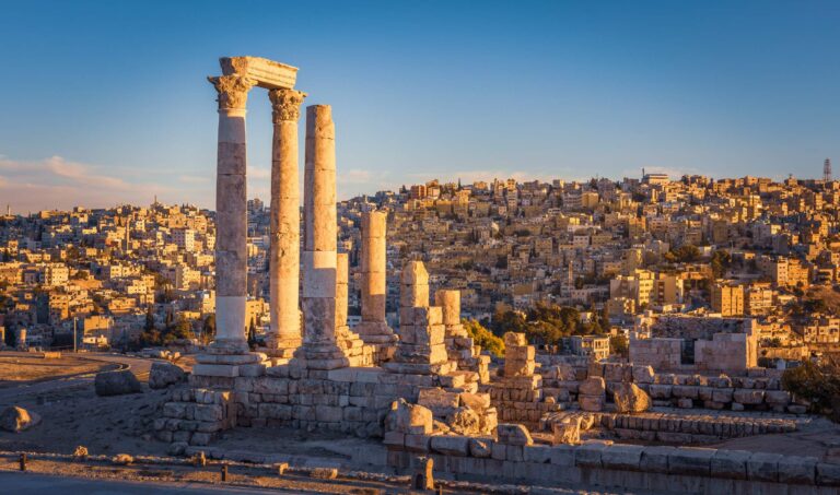 The column remains of the Temple of Hercules overlooking the sand-coloured city of Amman in Jordan