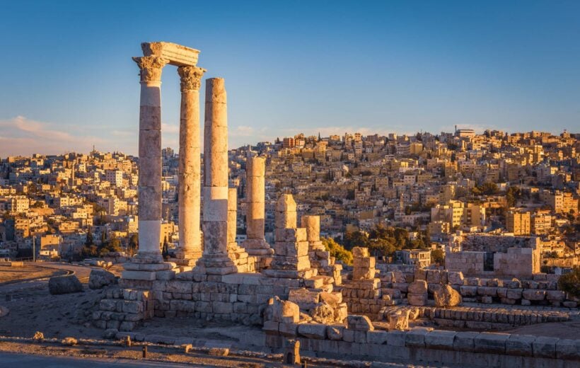 The column remains of the Temple of Hercules overlooking the sand-coloured city of Amman in Jordan