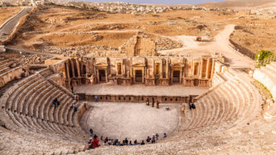 Large South Theatre - in antique town Jerash, Jordan with visiting tourists