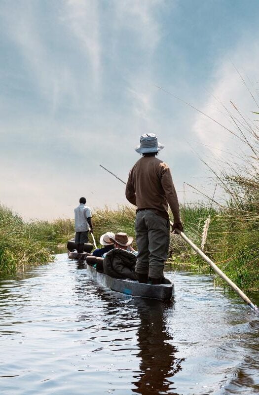 Adventure boat trip in a traditional Makoro at the Okavango Delta, Botswana