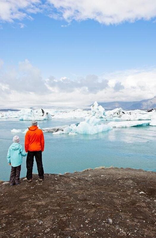 family in iceland iceland, jokulsarlon, glacier, iceberg, lagoon, vatnajokull, family, travel,