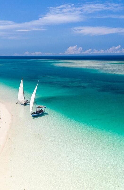 Dhow boats moored at a secluded sandbank at Pemba Island, Tanzania.