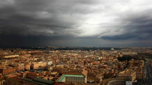 View of Rome from the dome of St Peter's Basilica during a thunderstorm, Italy