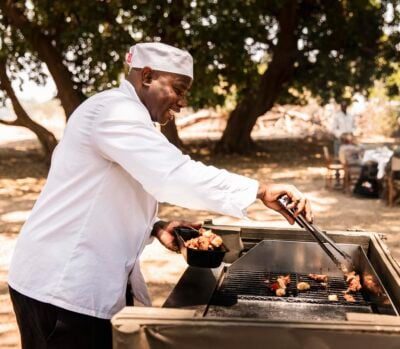 Outdoor cooking at Wilderness Little Ruckomechi camp, Zimbabwe