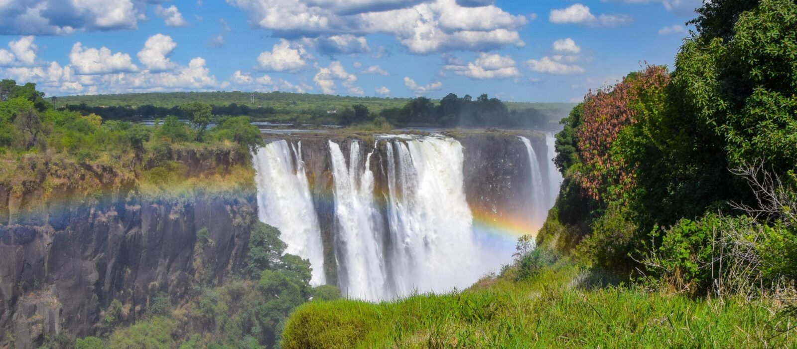 A rainbow appearing over Victoria Falls in Zimbabwe