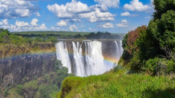 A rainbow appearing over Victoria Falls in Zimbabwe